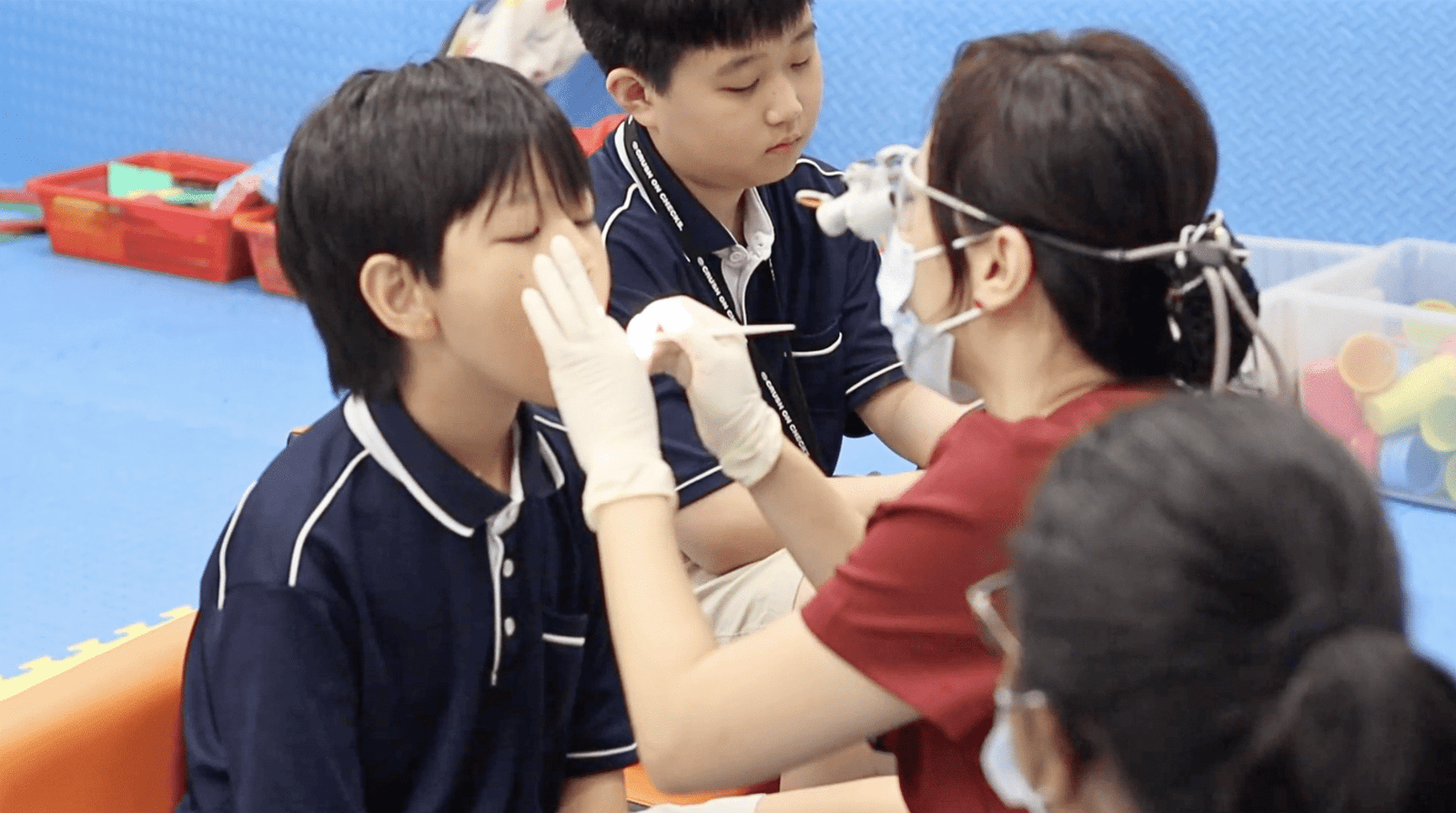Child at a dental check-up with a general dentist at Meiplus Dentalcare Singapore