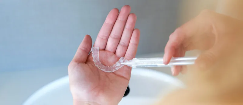 using teeth whitening tray